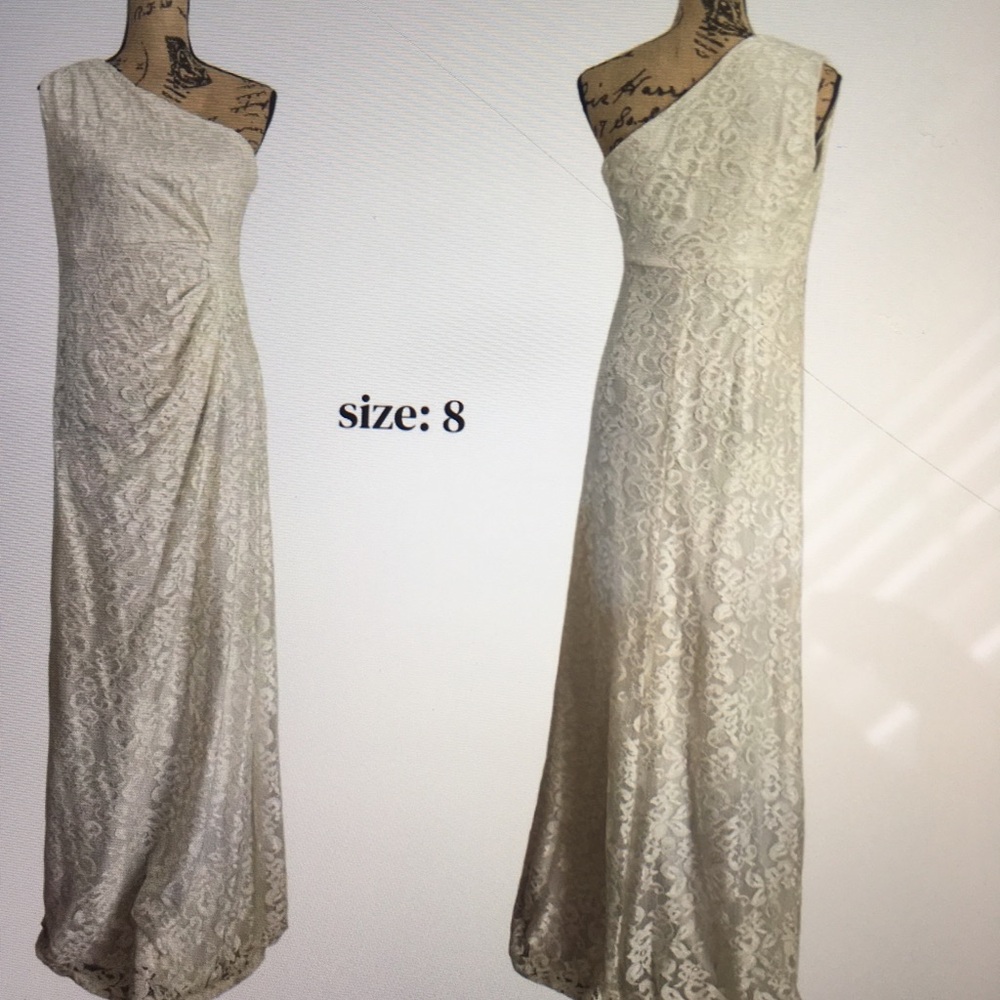 One shouldered lace lined gown perfect for prom, reception or casual wedding.